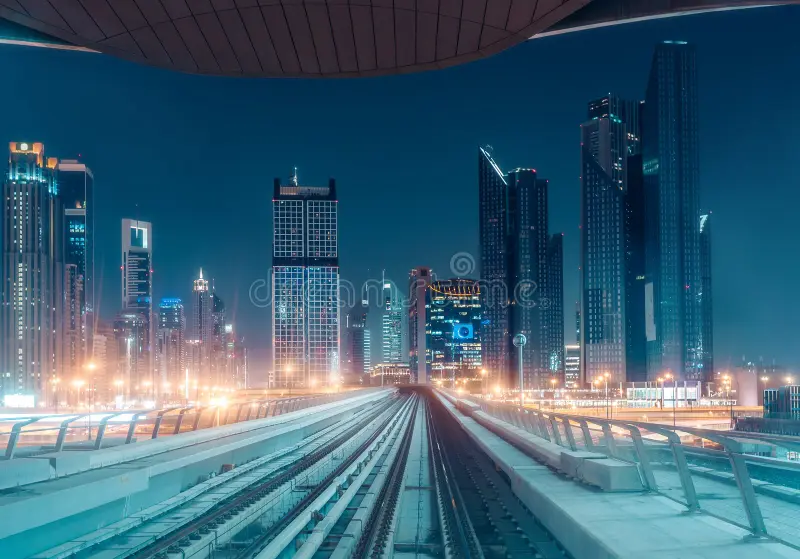 illuminated-modern-architecture-dubai-downtown-night-seen-metro-train-nighttime-skyline-85041798